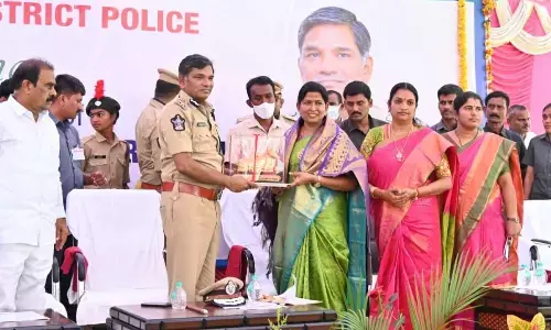 DGP K V Rajendranath Reddy felicitating Home Minister Taneti Vanitha in Anantapur on Sunday