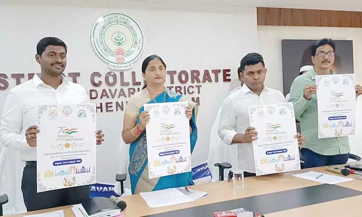 District Collector K Madhavi Latha, Joint Collector Sridhar, Municipal Commissioner Dinesh Kumar and DRO Subbarao unveiling Azadi ka Amrit Mahotsav brochures in Rajamahendravaram on Monday