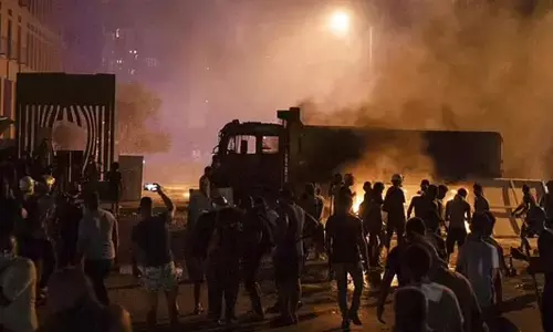 Demonstrators clash with police during a protest against the political elites and the government after the deadly explosion at Beirut port in August 2020. (Photo | AP)