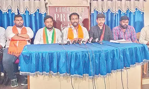 BJYM state secretary Ramesh Naidu addressing media persons in Tirupati on Monday