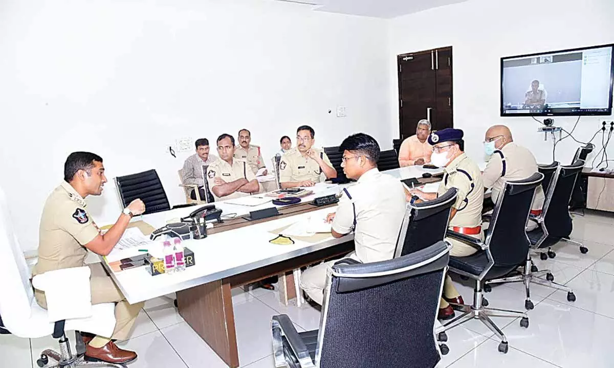 DCP Vishal Gunni addressing the Assistant Commissioners of Police at a meeting at the Commissioner office in Vijayawada on Wednesday