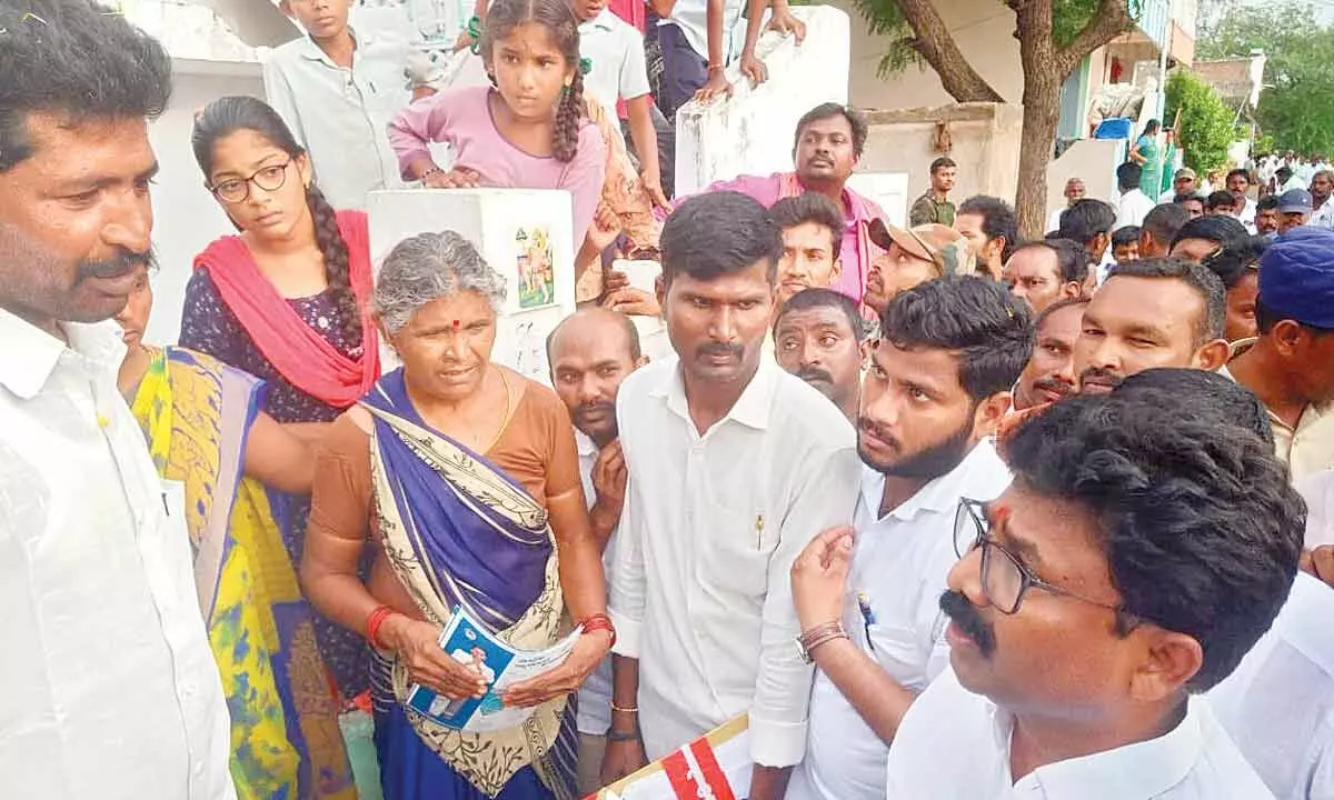 MAUD Minister Audimulapu SUresh interacting with locals at Sanikavaram village on Wednesday