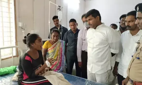 IT Minister interacting with gas leak victims in Anakapalli district on Wednesday