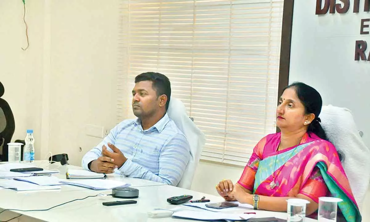 District Collector K Madhavi Latha and Joint Collector Ch Shridhar attending a video conference from the Collectorate in Rajamahendravaram on Thursday