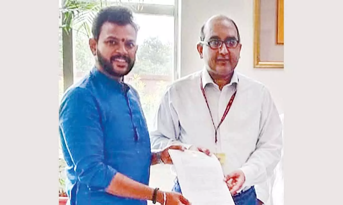 MP, K Rammohan Naidu (left) submitting representation to foreign affairs ministry official at New Delhi on workers’ issues
