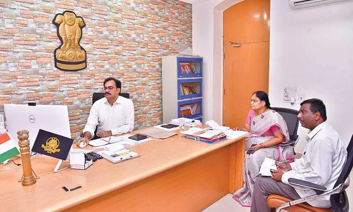 District Collector M Venugopal Reddy participating the video conference with Special Chief Secretary B Rajasekhar from the Collectorate in Guntur on Thursday