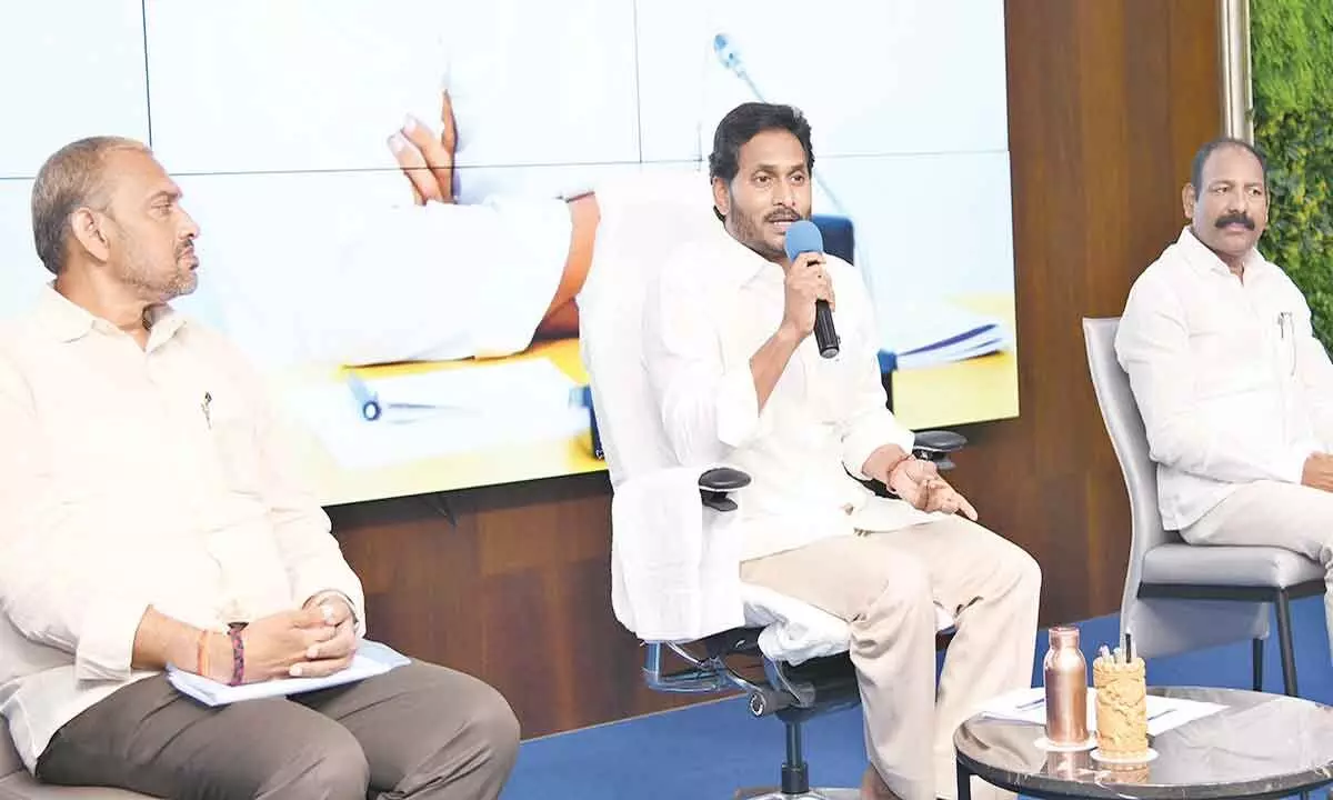 Chief Minister Y S Jagan Mohan Reddy addressing a meeting of YSRCP workers from Rajam constituency in Tadepalli on Friday. MLC P Vikrant and Rajam MLA K Jogulu are also seen on the dais.
