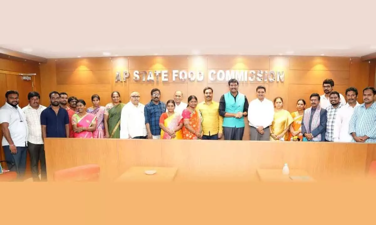 Food Commission Chairman Chitta Vijay Pratap Reddy along with the retiring members of AP State Food Commission in Vijayawada on Friday