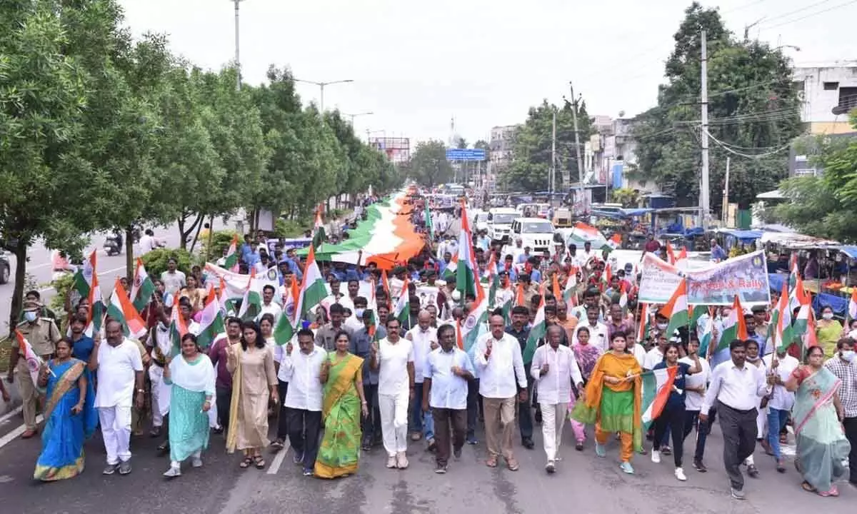 District Collector M Venugopal Reddy leading a huge rally conducted in Guntur city on Saturday on the occasion of the completion of 75 years of Independence. Joint Collector G Rajakumari, GMC Commissioner Kirthi Cherkuri, ZP chairperson Henry Christina, MLAs Mustafa, Dr Undavalli Sridevi, MLC Lella Appi Reddy and K S Lakshmana Rao are also seen.