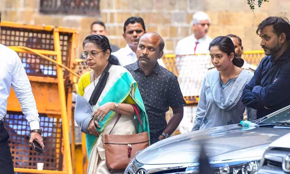 Shiv Sena MP Sanjay Rauts wife Varsha Raut arrives at the Enforcement Directorate office after she was summoned by the agency in connection with the Patra Chawl land case, in Mumbai on Saturday