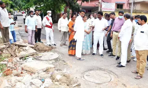 Minister for Municipal Administration and Urban Development Adimulapu Suresh interacting with the locals as a part of his visit to Visakhapatnam on Saturday
