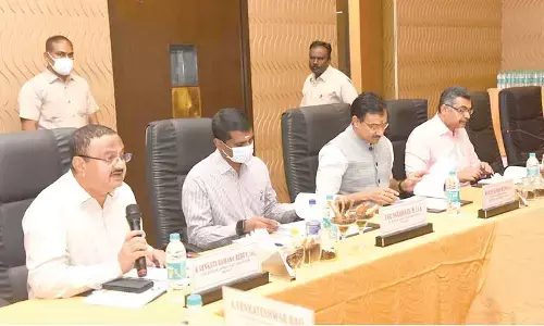 Deputy Election Commissioner Nitesh Kumar Vyas, Chittoor and Tirupati Collectors M Hari Narayanan and K Venkata Ramana Reddy at a review meeting on SSR in Tirupati on Saturday