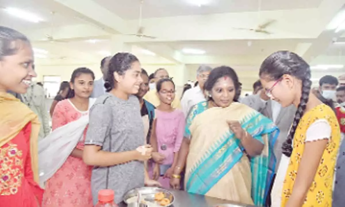 The State Governor Dr Tamilisai Soundararajan interacting with students at IIIT RGUKT in Basara on Sunday