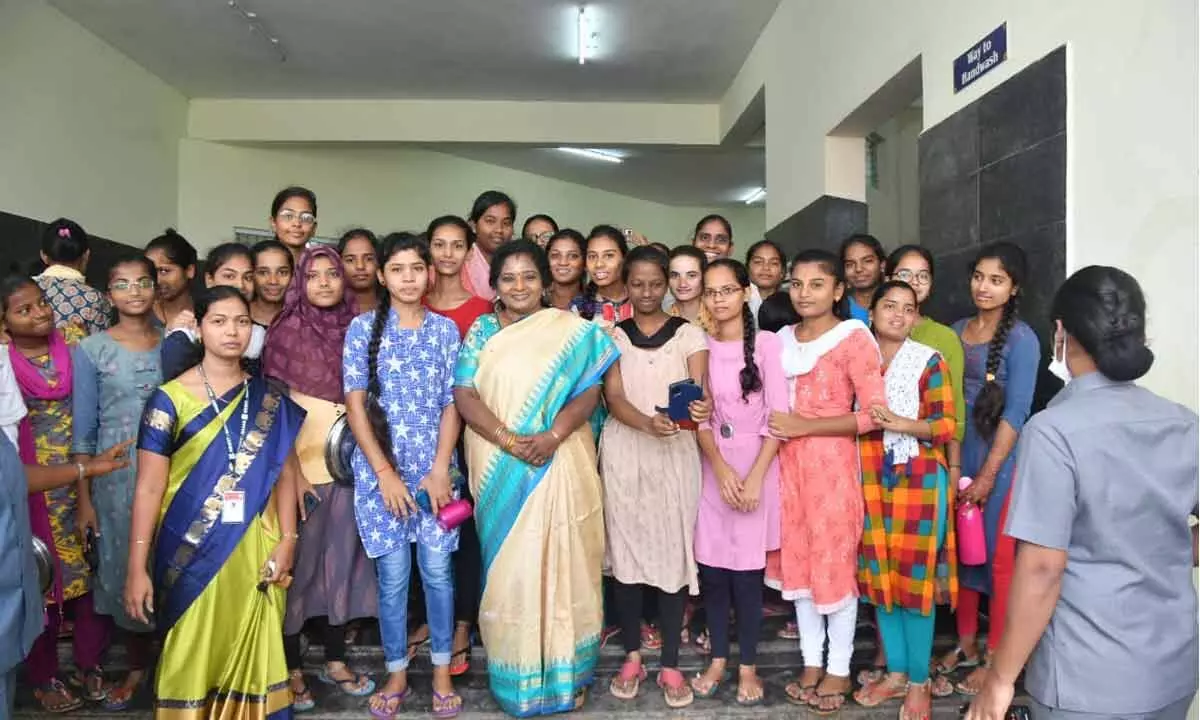 Governor Dr Tamilisai Soundararajan posing for a photo with the students at IIIT RGUKT in Basara on Sunday