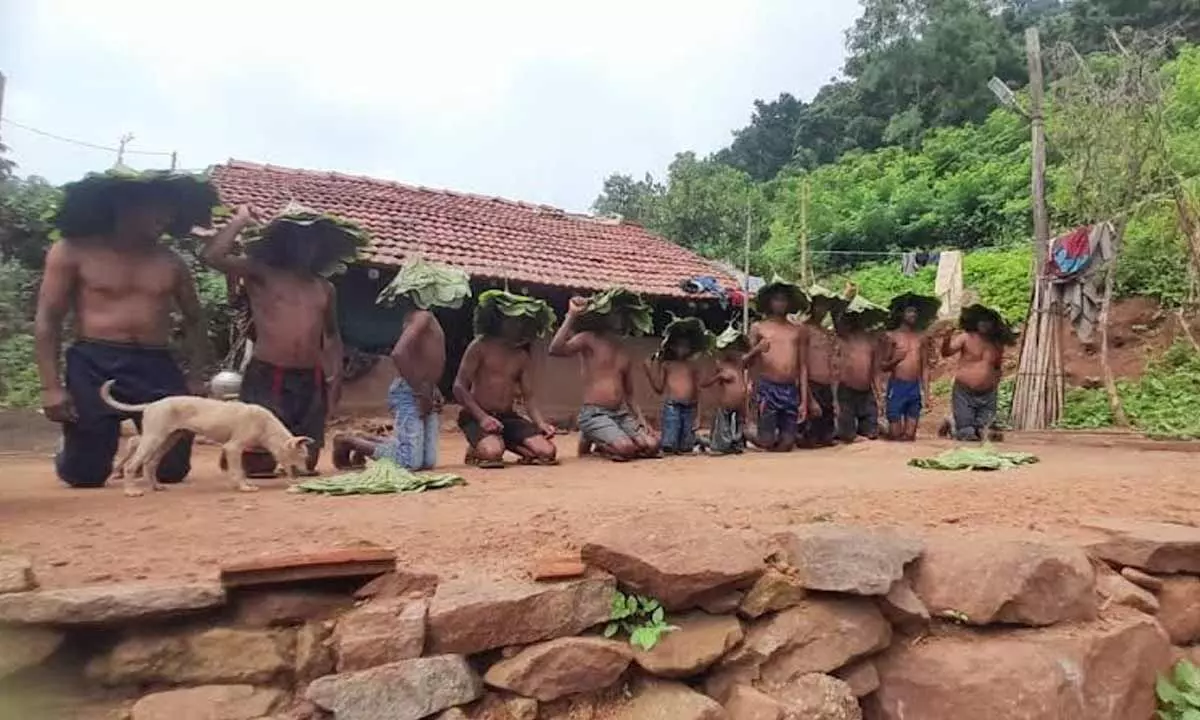 Tribals staging a protest demanding basic amenities and voting rights at Pasuvalabanda