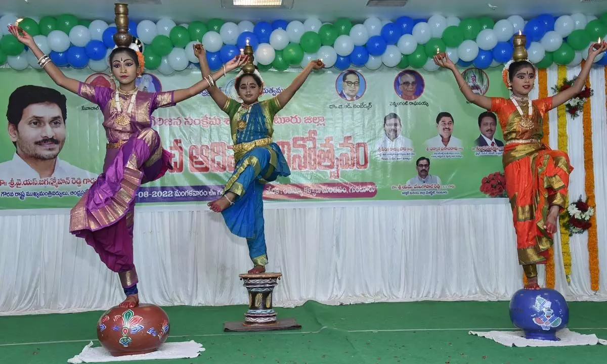 Girls presenting a dance programme in Guntur on Tuesday on the occasion of World Adivasi Day