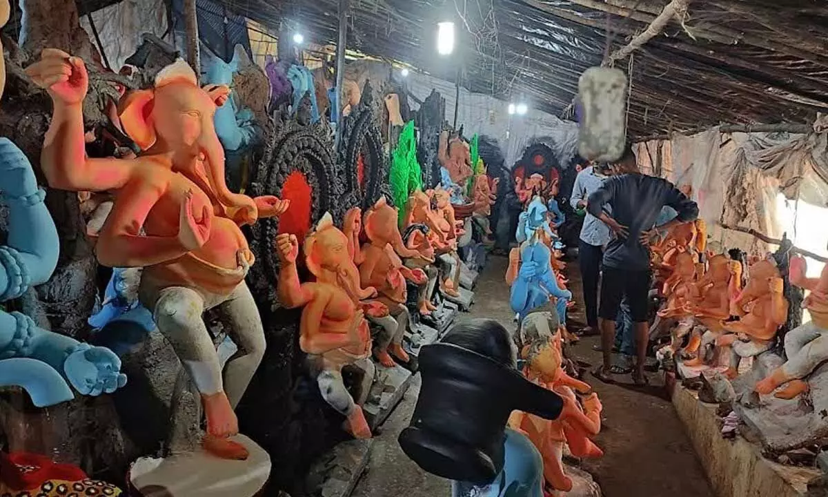 Photo caption: Ganesh idols getting readied at a makeshift workshop in Visakhapatnam (Photo: Vasu Potnuru)