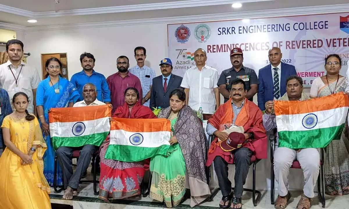 The family members of martyrs and former soldiers being felicitated at SRKR Engineering College in Bhimavaram on Thursday