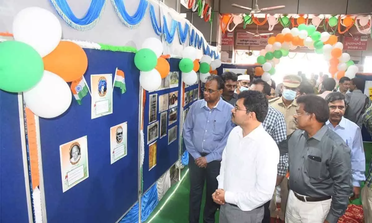 District Collector A Mallikarjuna browsing through the photo exhibits at Dwaraka bus station in Visakhapatnam on Thursday