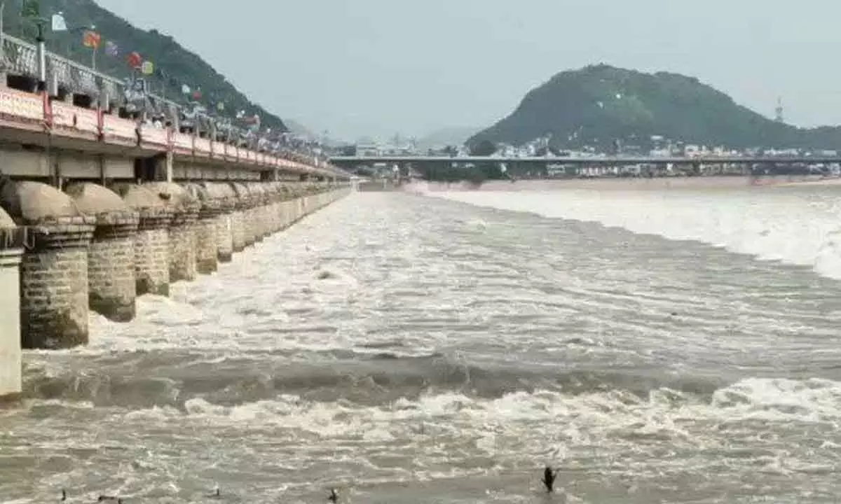 All 70 gates of Prakasam barrage are lifted releasing 4.44 lakh cusecs floodwaters into the Bay of Bengal on Friday. The authorities cautioned the people downstream to be alert.