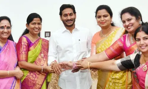Women ministers tie Rakhi to  AP CM YS Jagan Mohan Reddy