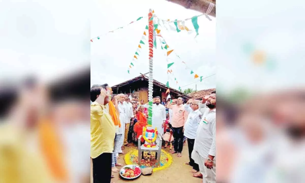 BJP leaders celebrating the Independence Day in a tribal tanda in Sathupalli constituency on Monday