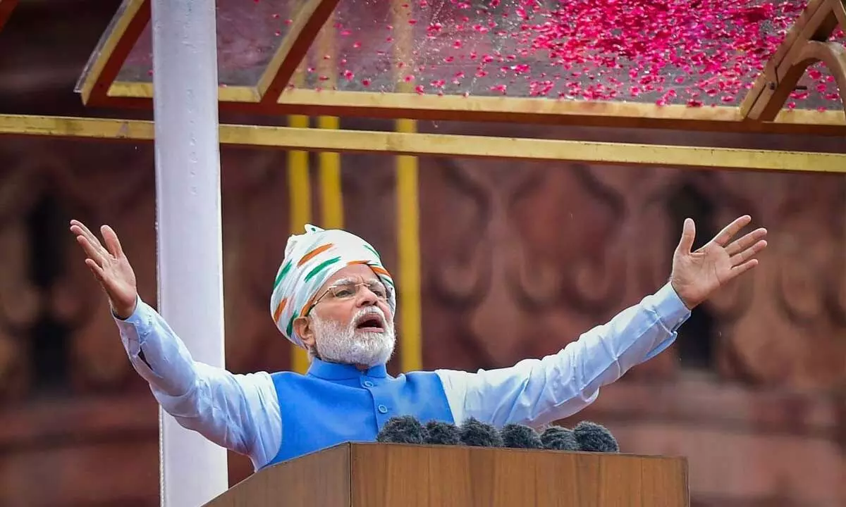 Prime Minister Narendra Modi gestures as he addresses the nation from the ramparts of the Red Fort on the occasion of the 76th Independence Day, in New Delhi on Monday