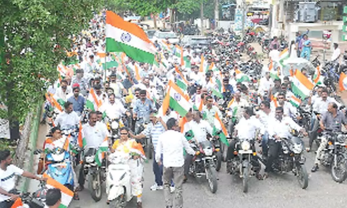 TDP State vice- president Damacharla Janardhana Rao, party leaders and activists taking out a motorcycle rally in Ongole on Monday