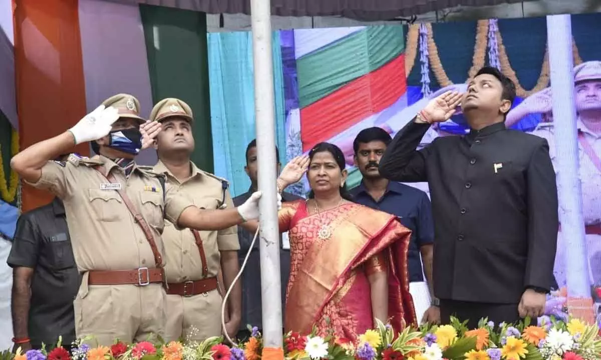 District In-charge Minister T Vanitha, Collector Nitish Kumar and SP R Vidyasagar Naidu saluting the national flag in Parvathipuram in Manyam district on Monday