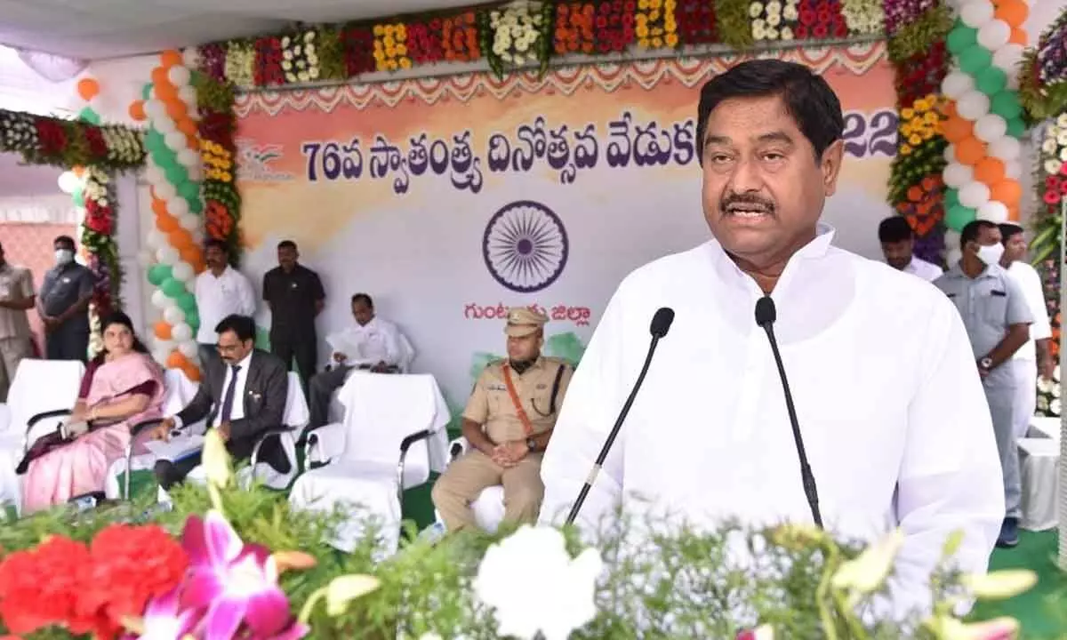 District in-charge Minister Dharmana Prasada Rao speaking at a programme on Independence Day celebrations at Police Parade Grounds in Guntur on Monday. District Collector M Venugopal Reddy, Joint Collector G Rajakumari and SP K Arif Hafeez are also seen.