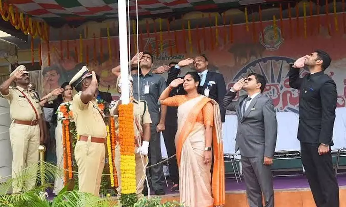 Health Minister Vidadala Rajini saluting the national flag at police barracks in Visakhapatnam as part of I-Day celebrations on Monday