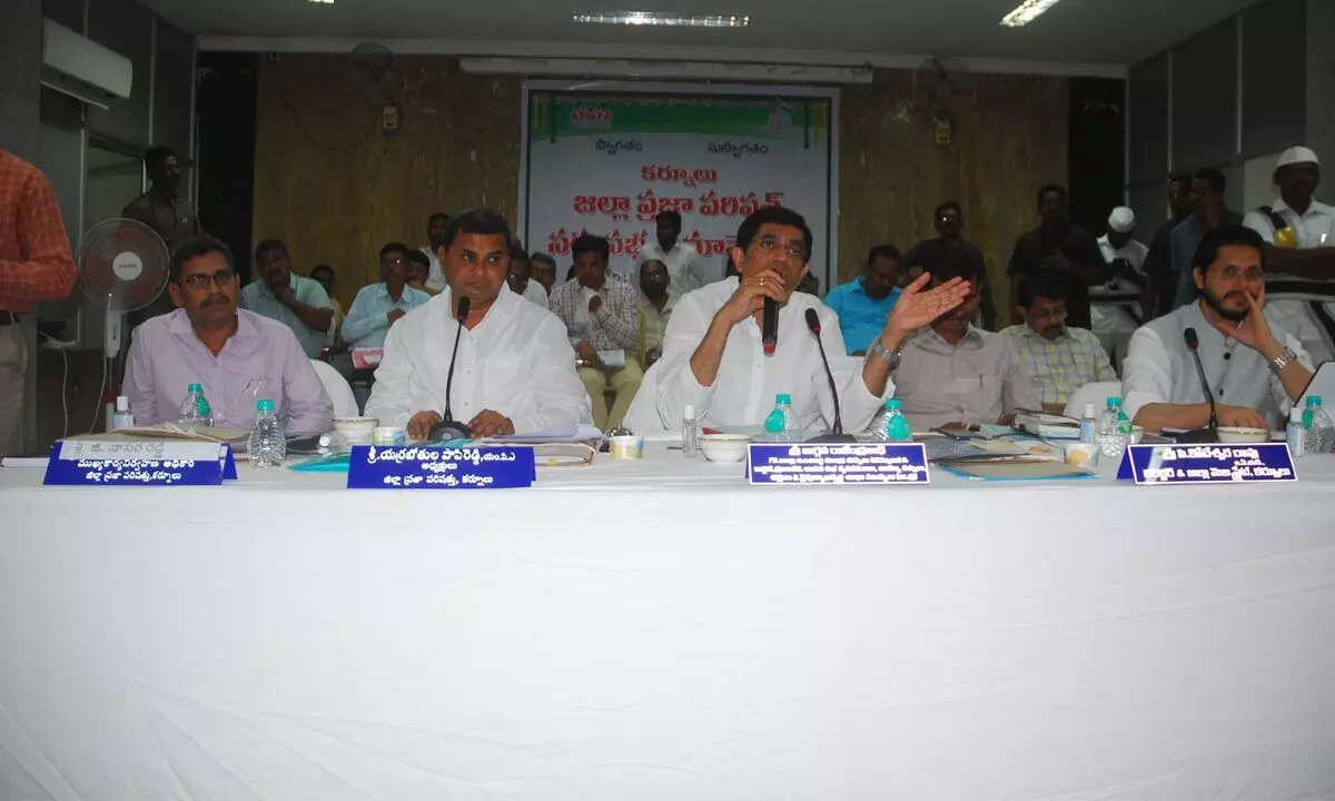 Finance minister Buggna Rajendranath Reddy addressing the ZP general body meeting in Kurnool on Tuesday. District collectors of Kurnool and Nandyal P Koteshwara Rao and Dr Manazir Jilani Samoon and ZP chairman, Yerrabothula Papi Reddy are  also seen.