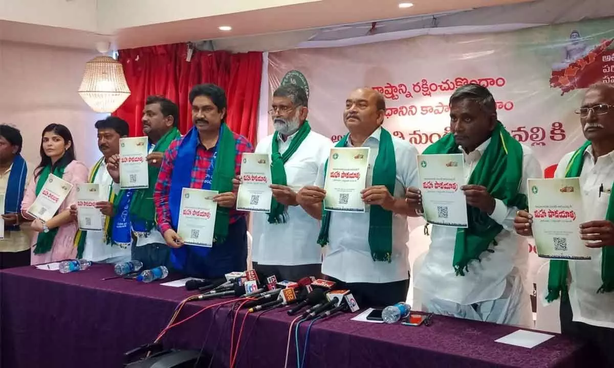 Amaravati Parirakshana Samithi members releasing QR code brochure for enrollment of members for Maha Padayatra, in Vijayawada on Thursday