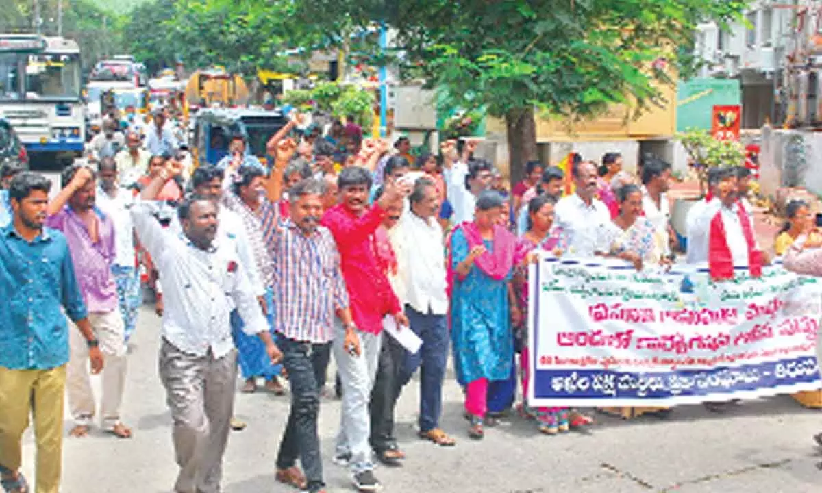 CPI, CPM, RPI, women organisation members take part in a protest rally against handing over of maternity hospital to MCT, in Tirupati on Thursday