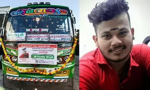 A bus plying with flex board seeking financial help for Shyamjith