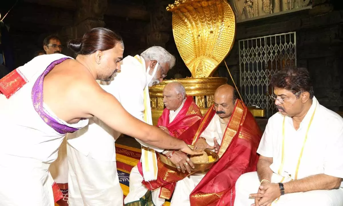 TTD Chairman Subba Reddy offering theertha prasadam to Karnataka CM Basavaraj Bommai and former CM B S Yediyurappa in Tirumala on Friday