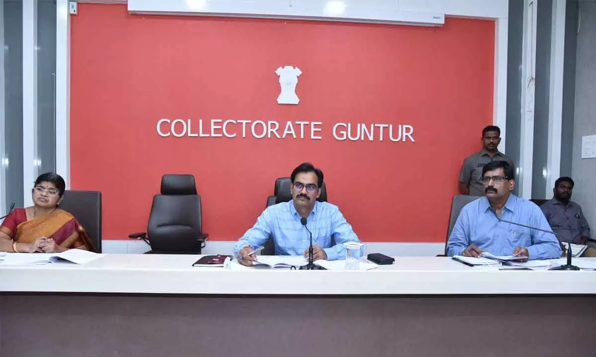 District Collector M Venugopala Reddy addressing a meeting at the Collectorate in Guntur on Monday