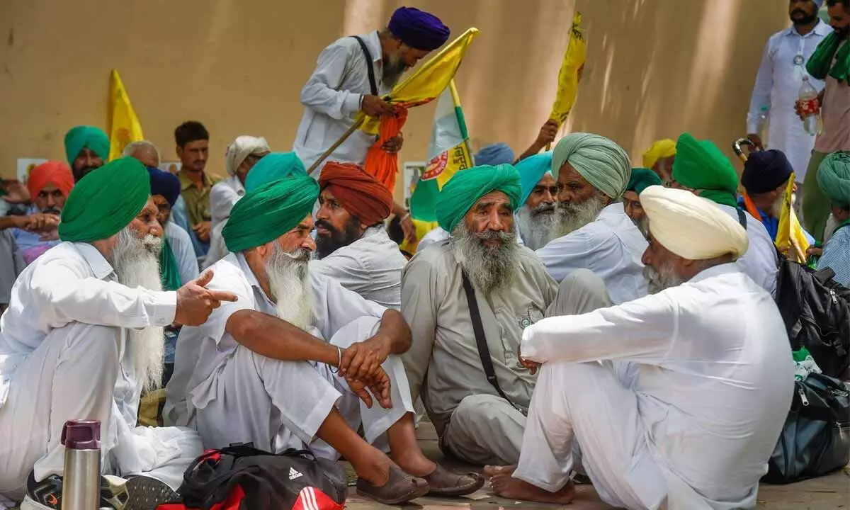 Farmers gather for a protest at Jantar Mantar, in New Delhi on Monday