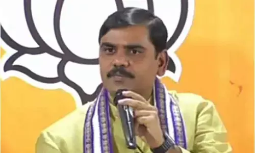 BJP state general secretary S Vishnuvardhan Reddy addressing a press conference at party state office in Vijayawada on Monday