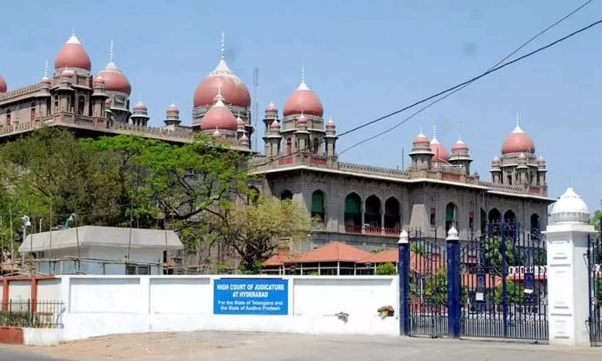 File status report on hussain sagar lake encroachments: Telangana High Court