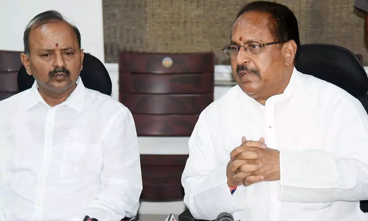 Minister for endowments  Kottu Satyanarayana (right) addressing a press conference at endowments office at Gollapudi in  Vijayawada on Tuesday