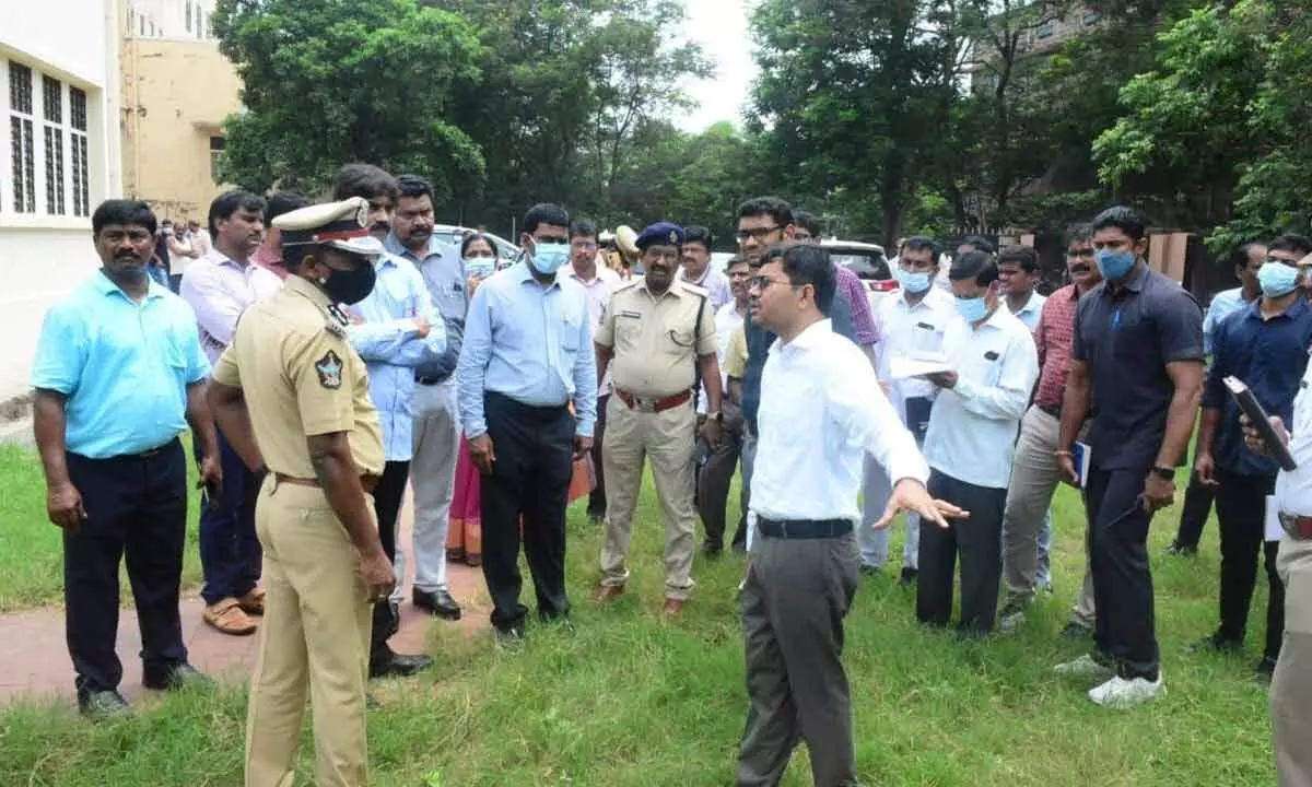 District Collector A Mallikarjuna, City Police Commissioner CH Srikanth, among others, checking the arrangements made at AU Convention Centre at Beach Road in Visakhapatnam on Wednesday