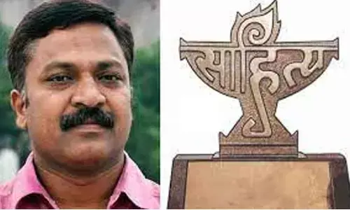 KCR pats Dr Pattipaka Mohan on bagging Balasahitya Puraskar