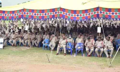 Krishna district police at a meeting at Pedana market yard on Wednesday