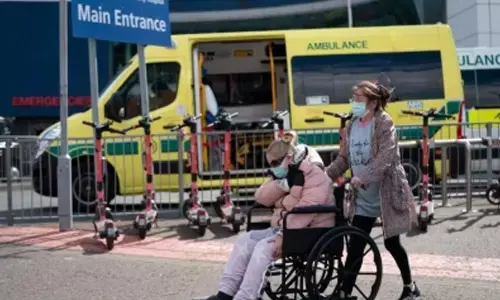 England pauses Covid testing for health staff without symptoms