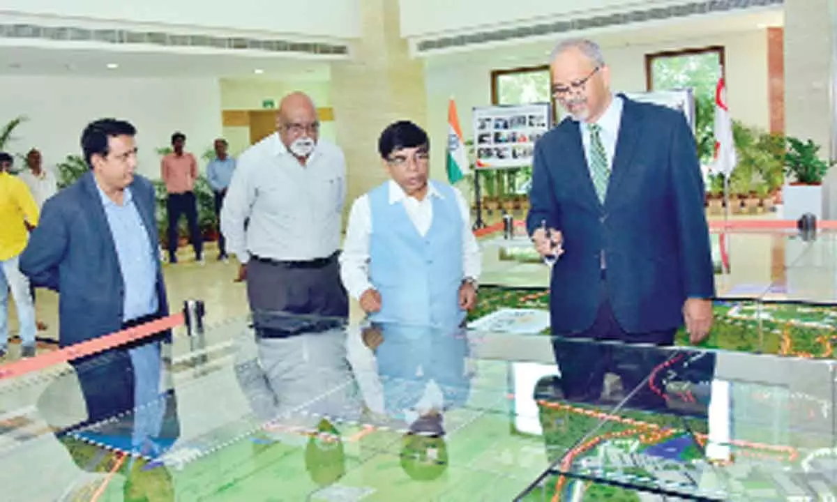 Union Minister of State for Education Dr Subhas Sarkar being briefed about the Sri City by its President (operations) Satish Kamat on Friday