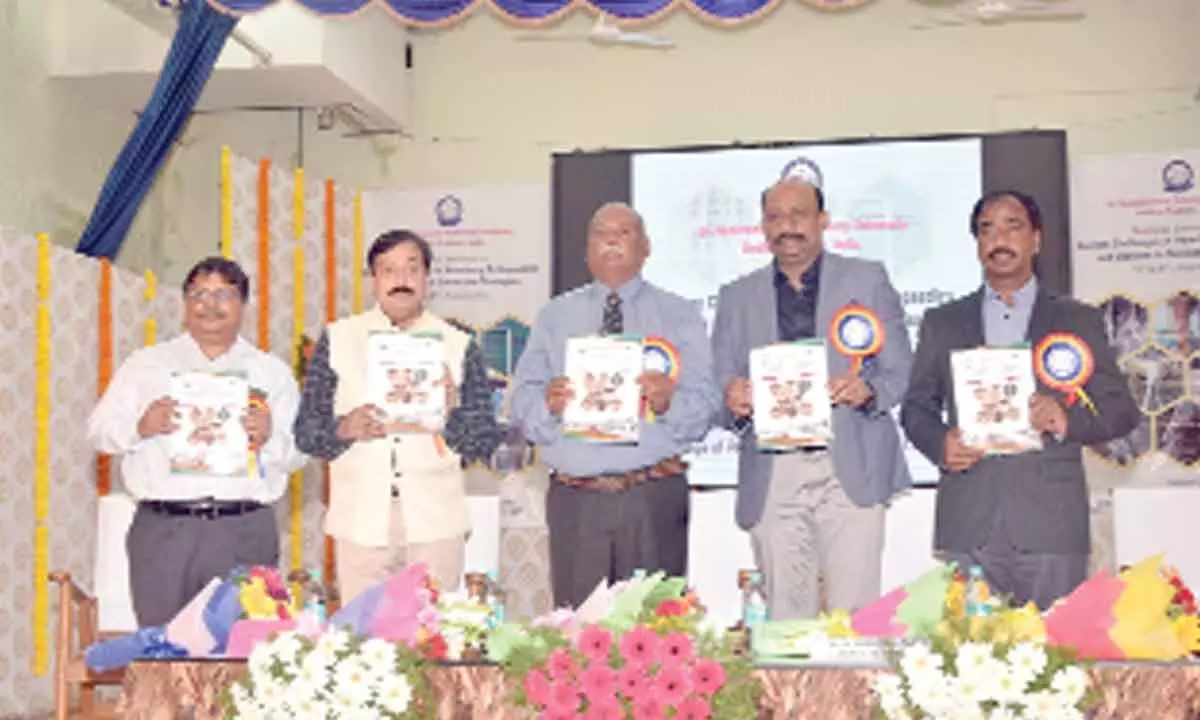 Dr S Thilagar, former Vice-Chancellor of  Tamil Nadu Veterinary and Animal Sciences University (TANUVAS), along with others releasing a brochure on veterinary orthopaedics at SVVU in Tirupati on Friday