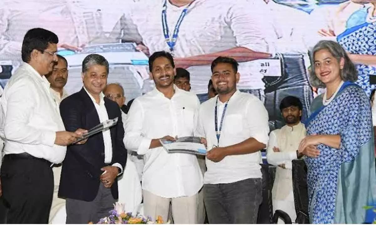 Chief Minister YS Jagan Mohan Reddy distributing certificates to the students trained by Microsoft in Visakhapatnam on Friday