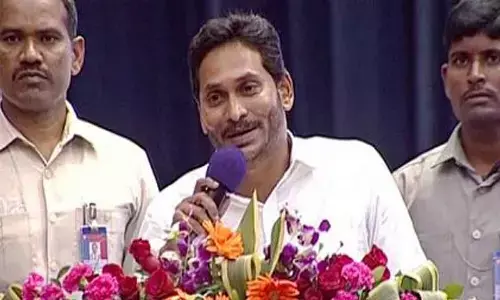 YS Jagan distributes Microsoft training certificate at an event held in Visakhapatnam