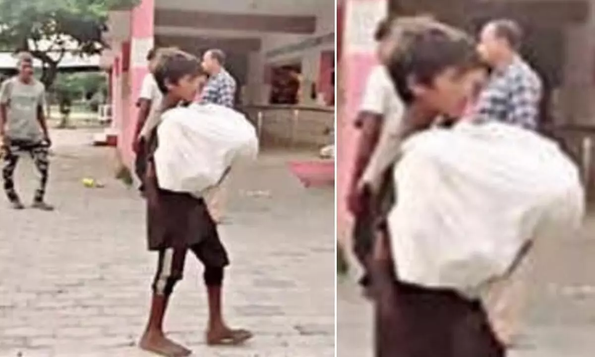 Denied ambulance, 10-yr-old carries brothers body in UP district